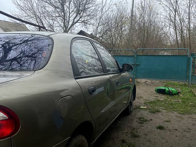 Зеленый Дэу Ланос, объемом двигателя 1.5 л и пробегом 219 тыс. км за 1500 $, фото 3 на Automoto.ua