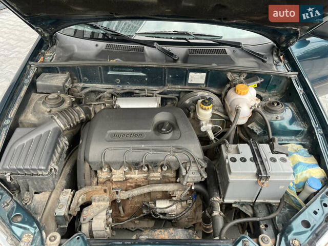 Зеленый Дэу Ланос, объемом двигателя 1.3 л и пробегом 153 тыс. км за 1500 $, фото 17 на Automoto.ua