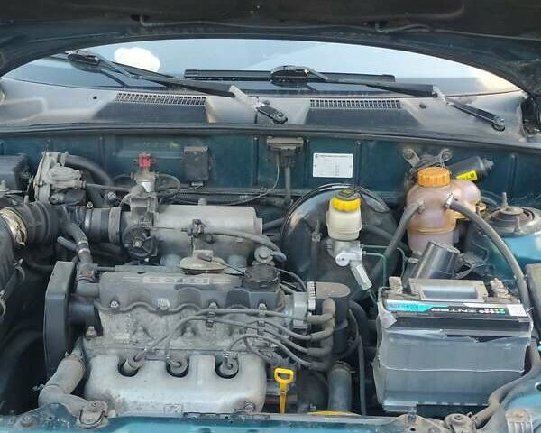 Зеленый Дэу Ланос, объемом двигателя 1.5 л и пробегом 136 тыс. км за 2200 $, фото 21 на Automoto.ua