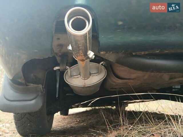 Зеленый Дэу Ланос, объемом двигателя 1.4 л и пробегом 114 тыс. км за 2200 $, фото 11 на Automoto.ua