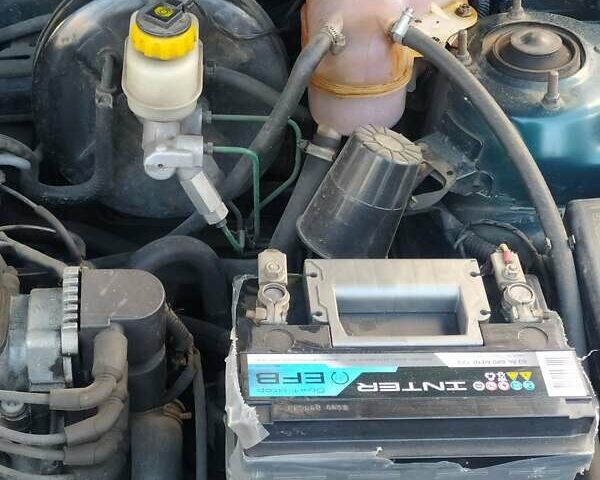 Зеленый Дэу Ланос, объемом двигателя 1.5 л и пробегом 136 тыс. км за 2200 $, фото 3 на Automoto.ua