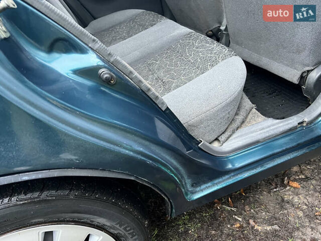 Зелений Деу Ланос, об'ємом двигуна 1.5 л та пробігом 192 тис. км за 1850 $, фото 23 на Automoto.ua