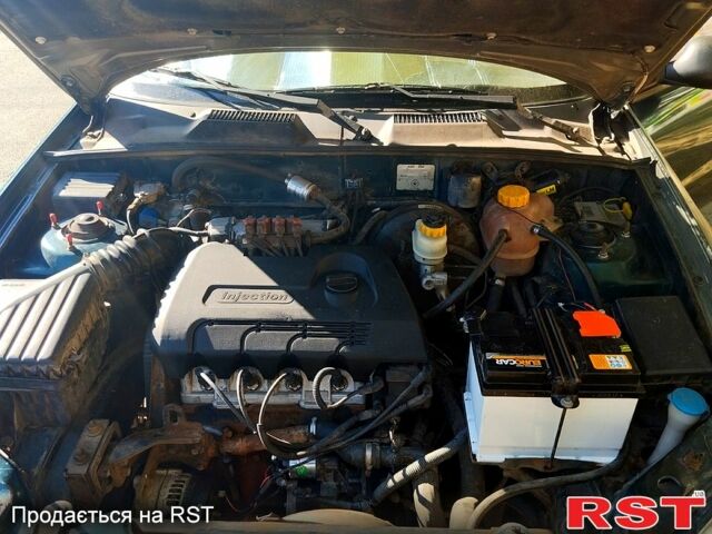 Зеленый Дэу Ланос, объемом двигателя 1.4 л и пробегом 350 тыс. км за 1300 $, фото 5 на Automoto.ua