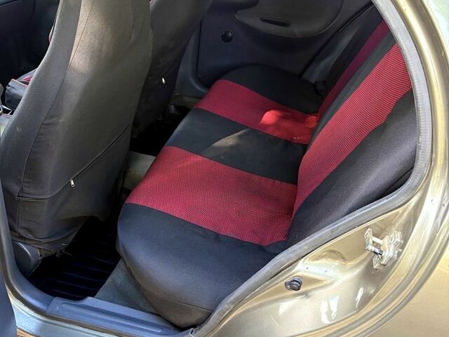 Зеленый Дэу Ланос, объемом двигателя 1.4 л и пробегом 136 тыс. км за 1400 $, фото 3 на Automoto.ua