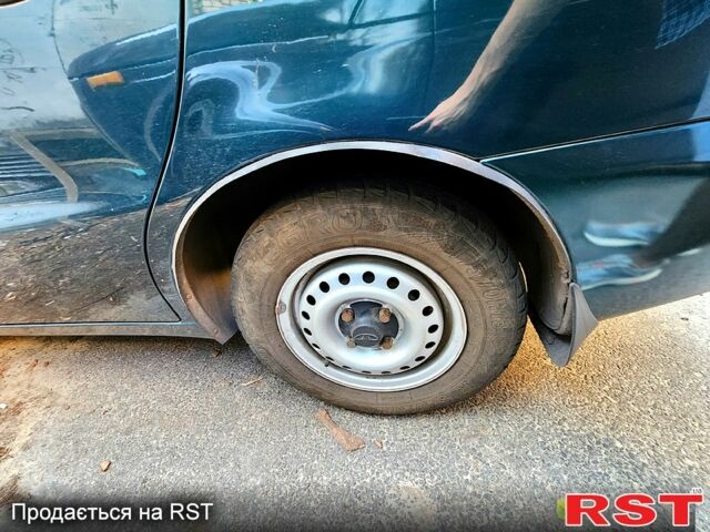 Зеленый Дэу Ланос, объемом двигателя 1.4 л и пробегом 119 тыс. км за 2300 $, фото 2 на Automoto.ua