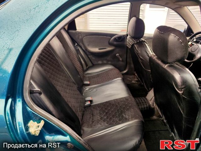 Зеленый Дэу Ланос, объемом двигателя 1.5 л и пробегом 283 тыс. км за 2200 $, фото 8 на Automoto.ua