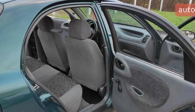 Дэу Ланос 2007 в Ровно на Automoto.ua Зеленый Дэу Ланос, объемом двигателя 1.5 л и пробегом 174 тыс. км за 2300 $, фото 11 на Automoto.ua