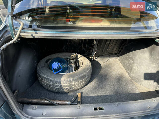 Зелений Деу Ланос, об'ємом двигуна 1.5 л та пробігом 334 тис. км за 1800 $, фото 13 на Automoto.ua