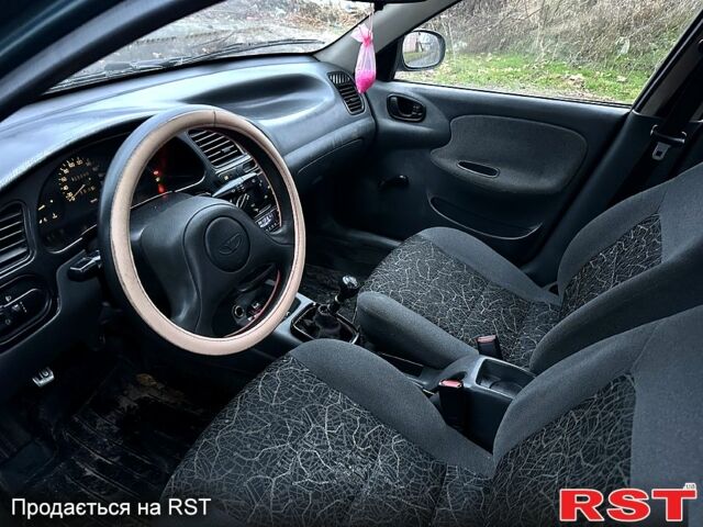 Зеленый Дэу Ланос, объемом двигателя 1.4 л и пробегом 190 тыс. км за 1899 $, фото 7 на Automoto.ua