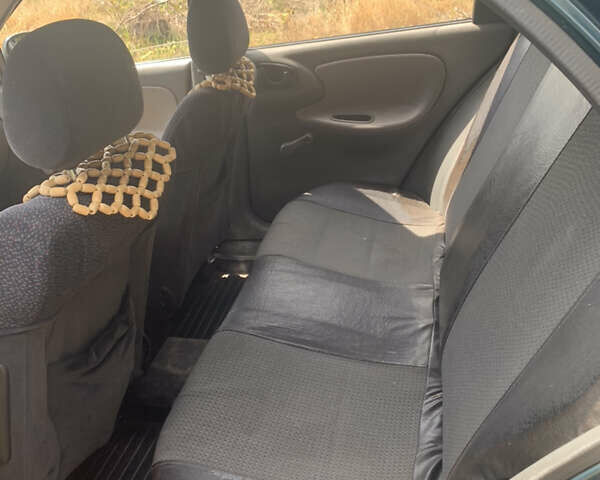 Зеленый Дэу Ланос, объемом двигателя 1.5 л и пробегом 227 тыс. км за 2100 $, фото 4 на Automoto.ua