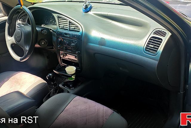 Зеленый Дэу Ланос, объемом двигателя 1.6 л и пробегом 303 тыс. км за 2000 $, фото 3 на Automoto.ua