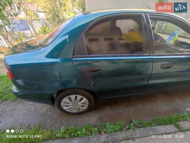 Зеленый Дэу Ланос, объемом двигателя 1.6 л и пробегом 127 тыс. км за 3500 $, фото 28 на Automoto.ua