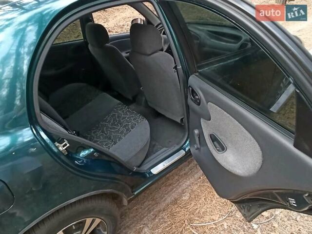 Зелений Деу Ланос, об'ємом двигуна 1.5 л та пробігом 196 тис. км за 3900 $, фото 16 на Automoto.ua