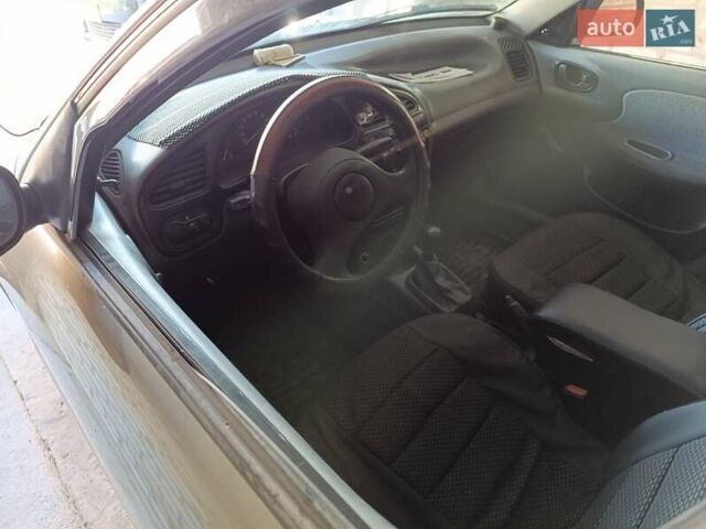 Зеленый Дэу Ланос, объемом двигателя 1.5 л и пробегом 280 тыс. км за 2100 $, фото 4 на Automoto.ua