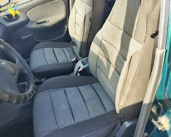 Зеленый Дэу Ланос, объемом двигателя 1.5 л и пробегом 182 тыс. км за 1999 $, фото 14 на Automoto.ua