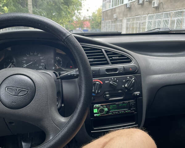 Зеленый Дэу Ланос, объемом двигателя 1.5 л и пробегом 290 тыс. км за 2000 $, фото 3 на Automoto.ua