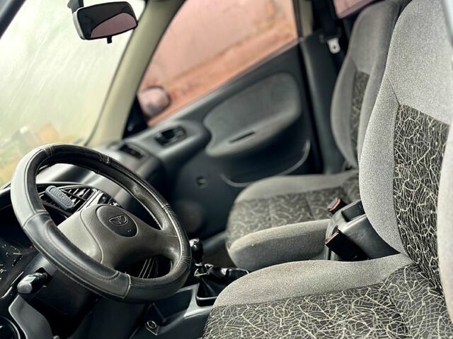 Зеленый Дэу Ланос, объемом двигателя 1.4 л и пробегом 214 тыс. км за 1999 $, фото 9 на Automoto.ua