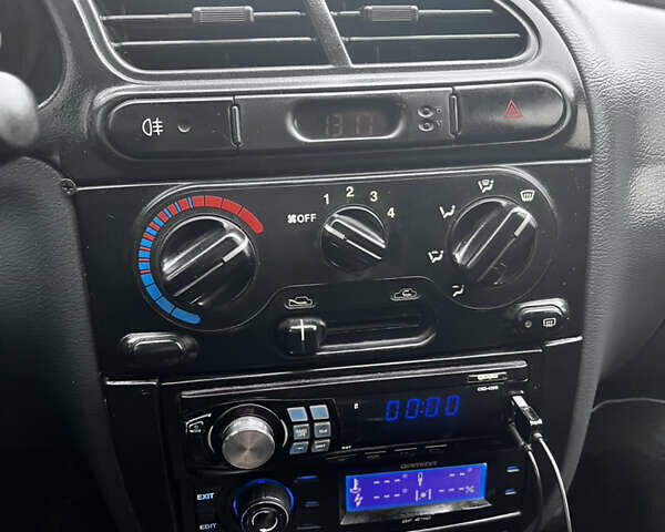 Зеленый Дэу Ланос, объемом двигателя 1.5 л и пробегом 251 тыс. км за 2800 $, фото 12 на Automoto.ua