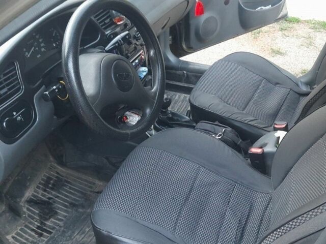 Зеленый Дэу Ланос, объемом двигателя 1.5 л и пробегом 120 тыс. км за 3000 $, фото 4 на Automoto.ua