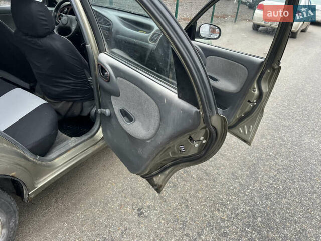 Зеленый Дэу Ланос, объемом двигателя 1.5 л и пробегом 250 тыс. км за 1600 $, фото 3 на Automoto.ua