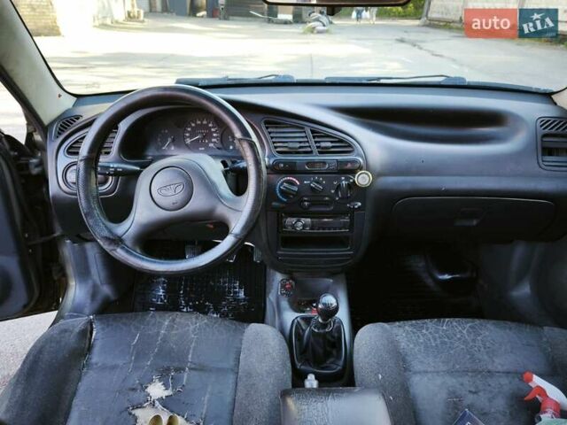 Зеленый Дэу Ланос, объемом двигателя 1.6 л и пробегом 375 тыс. км за 1800 $, фото 2 на Automoto.ua