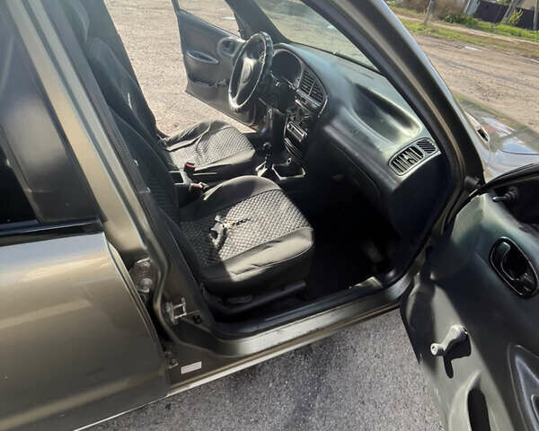 Зеленый Дэу Ланос, объемом двигателя 1.5 л и пробегом 265 тыс. км за 2400 $, фото 12 на Automoto.ua