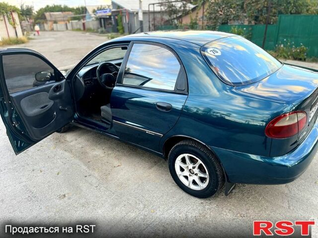 Дэу Ланос 2007 в Запорожье на Automoto.ua Зеленый Дэу Ланос, объемом двигателя 1.5 л и пробегом 154 тыс. км за 1650 $, фото 8 на Automoto.ua