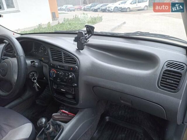 Зеленый Дэу Ланос, объемом двигателя 1.5 л и пробегом 207 тыс. км за 2450 $, фото 5 на Automoto.ua