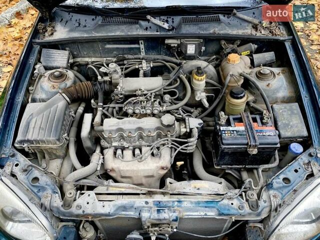 Зелений Деу Ланос, об'ємом двигуна 1.5 л та пробігом 220 тис. км за 2300 $, фото 46 на Automoto.ua