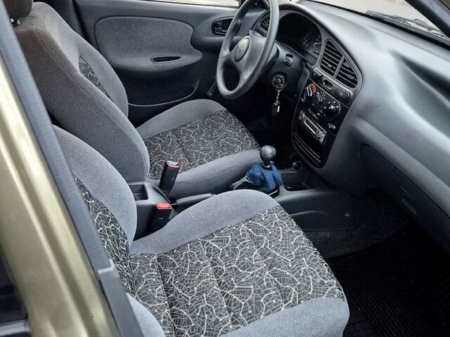 Зеленый Дэу Ланос, объемом двигателя 1.4 л и пробегом 47 тыс. км за 2800 $, фото 6 на Automoto.ua