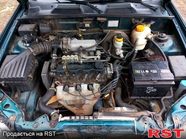Зеленый Дэу Ланос, объемом двигателя 1.5 л и пробегом 128 тыс. км за 1750 $, фото 5 на Automoto.ua