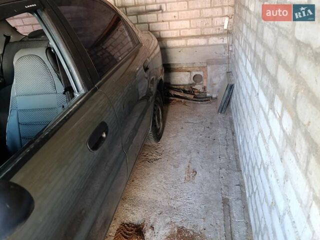 Зеленый Дэу Ланос, объемом двигателя 1.5 л и пробегом 280 тыс. км за 2100 $, фото 5 на Automoto.ua