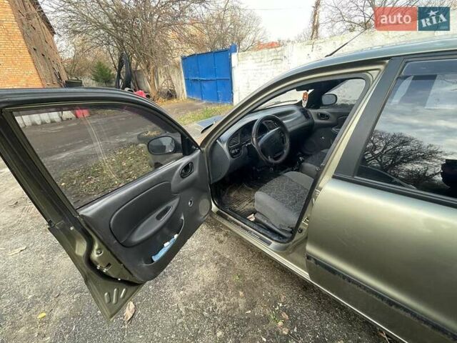 Зеленый Дэу Ланос, объемом двигателя 1.5 л и пробегом 150 тыс. км за 2500 $, фото 8 на Automoto.ua