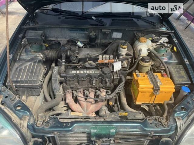 Зелений Деу Ланос, об'ємом двигуна 1.5 л та пробігом 260 тис. км за 2500 $, фото 29 на Automoto.ua