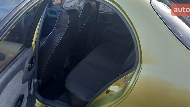 Зелений Деу Ланос, об'ємом двигуна 1.4 л та пробігом 140 тис. км за 3100 $, фото 6 на Automoto.ua