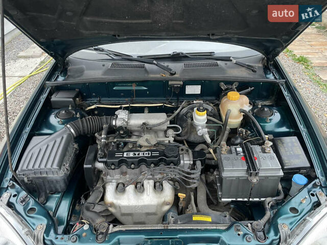 Зеленый Дэу Ланос, объемом двигателя 1.5 л и пробегом 133 тыс. км за 2200 $, фото 12 на Automoto.ua