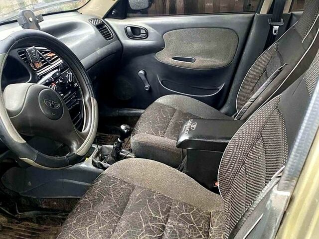 Зеленый Дэу Ланос, объемом двигателя 1.4 л и пробегом 232 тыс. км за 800 $, фото 7 на Automoto.ua