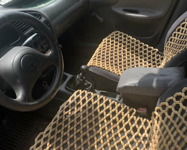 Зеленый Дэу Ланос, объемом двигателя 1.5 л и пробегом 227 тыс. км за 2100 $, фото 5 на Automoto.ua