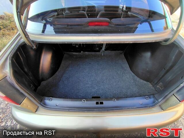 Зеленый Дэу Ланос, объемом двигателя 1.4 л и пробегом 146 тыс. км за 2200 $, фото 5 на Automoto.ua