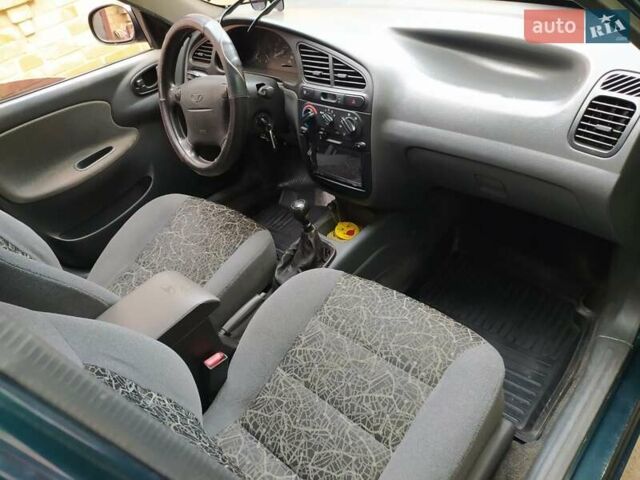 Зелений Деу Ланос, об'ємом двигуна 1 л та пробігом 220 тис. км за 2700 $, фото 6 на Automoto.ua
