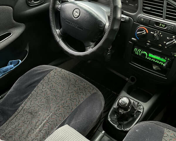 Зеленый Дэу Ланос, объемом двигателя 1.5 л и пробегом 220 тыс. км за 2300 $, фото 8 на Automoto.ua