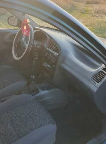 Зеленый Дэу Ланос, объемом двигателя 1.39 л и пробегом 215 тыс. км за 1800 $, фото 3 на Automoto.ua