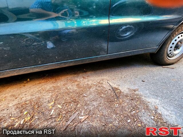 Зеленый Дэу Ланос, объемом двигателя 1.4 л и пробегом 119 тыс. км за 2300 $, фото 4 на Automoto.ua