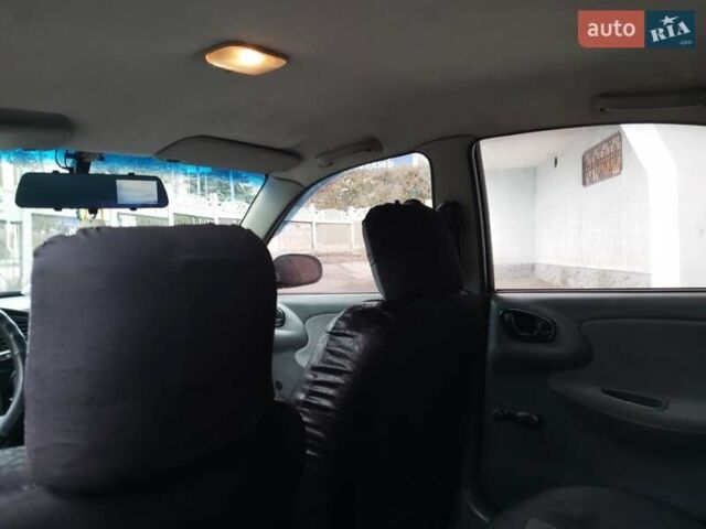 Зелений Деу Ланос, об'ємом двигуна 1.39 л та пробігом 260 тис. км за 2400 $, фото 4 на Automoto.ua