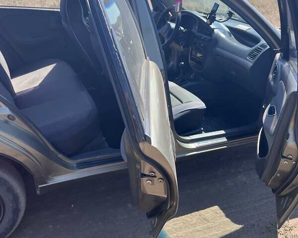 Зеленый Дэу Ланос, объемом двигателя 1.5 л и пробегом 372 тыс. км за 2500 $, фото 8 на Automoto.ua