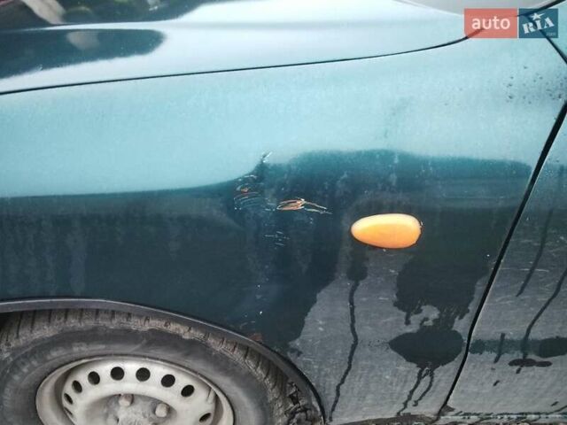 Зелений Деу Ланос, об'ємом двигуна 1.4 л та пробігом 188 тис. км за 1400 $, фото 28 на Automoto.ua