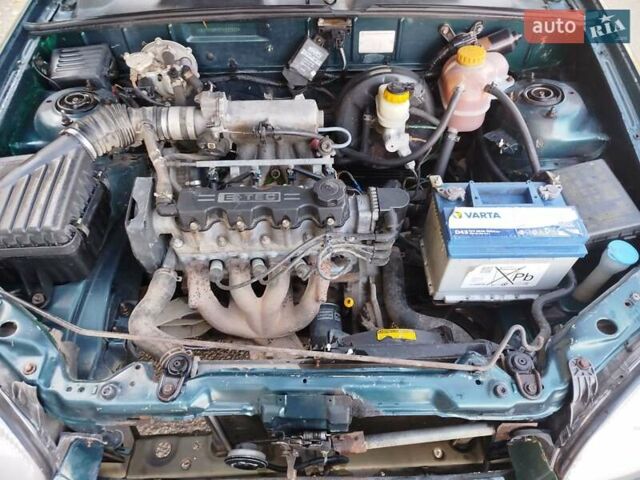 Зеленый Дэу Ланос, объемом двигателя 1.5 л и пробегом 400 тыс. км за 1850 $, фото 4 на Automoto.ua