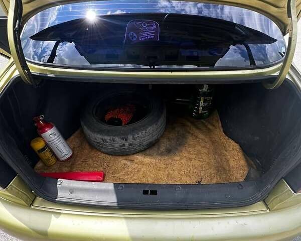 Деу Ланос 2007 у Кропивницькому (Кіровограді) на Automoto.ua Зелений Деу Ланос, об'ємом двигуна 1.5 л та пробігом 190 тис. км за 2900 $, фото 21 на Automoto.ua