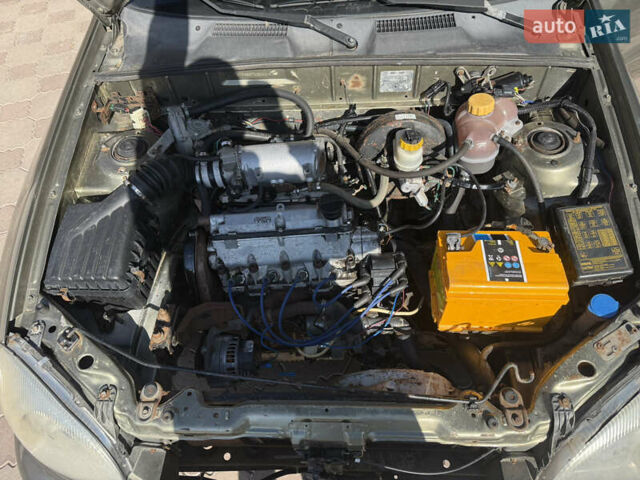 Зелений Деу Ланос, об'ємом двигуна 1.4 л та пробігом 555 тис. км за 875 $, фото 8 на Automoto.ua