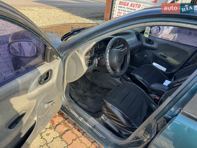 Зеленый Дэу Ланос, объемом двигателя 1.5 л и пробегом 170 тыс. км за 1900 $, фото 8 на Automoto.ua